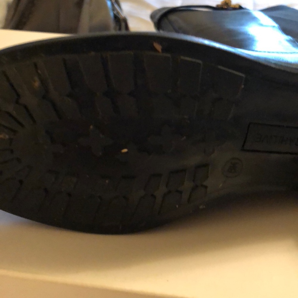 Black leather boots.